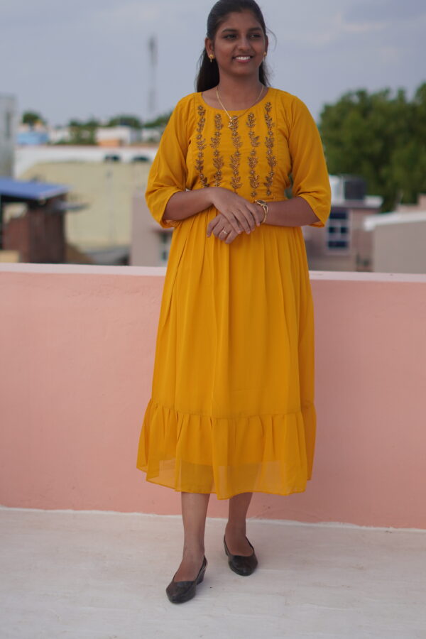 yellow colour Georgette Hand work feeding kuruthi
